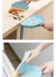 Close-up of blue mini broom and dustpan set cleaning food debris and window tracks