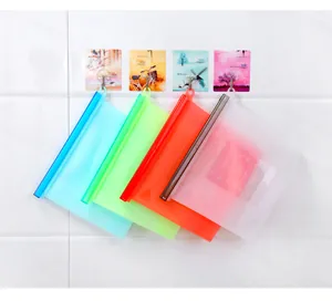 Close-up of 1500ml reusable silicone food storage bags in four vibrant, various colors.