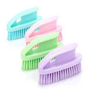 Set of four colorful plastic laundry and shoe brushes with ergonomic handles for daily home use