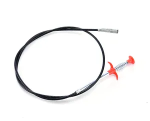 Macro view of a professional flexible drain cleaning tool with red handle and claw