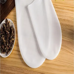 Close-up detail of a white food-grade silicone dough kneading bag for home baking.
