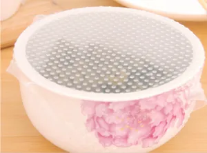 Close-up of reusable silicone food wrap showing textured surface on a floral bowl