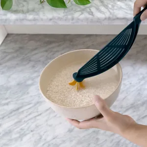 Creative manual rice washer and stirrer tool for efficient kitchen grain cleaning