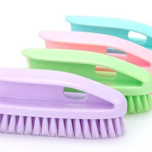 Multi-colored plastic laundry and shoe scrub brushes with ergonomic handles for home cleaning