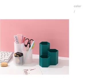 Detailed view of the modern 3-grid hexagonal pen holder for desktop stationery organization