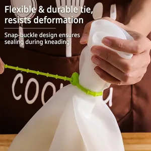 Durable food-grade silicone dough kneading bag with flexible green locking tie for home baking