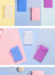 Detail view of portable silicone face mask storage bags in various pastel macaron colors