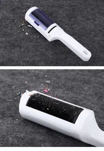 Macro detail of static lint brush showing effective removal of dust and pet hair