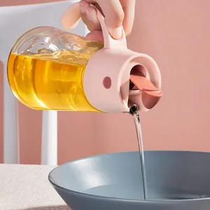 Elegant glass oil dispenser pot with automatic flip lid for kitchen seasoning use