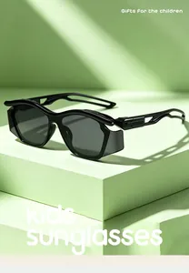 Detailed side view of kids' sporty hollowed-out sunglasses in matte black