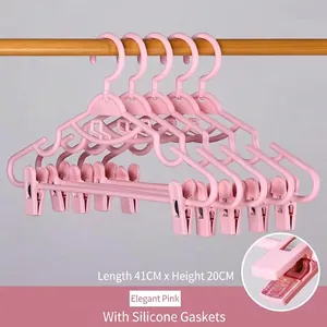 Cintres roses élégants avec pinces et patins en silicone antidérapants, 41cm x 20cm