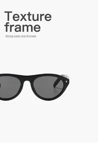 Close-up of retro black cat-eye sunglasses featuring stylish golden triangle rivet details