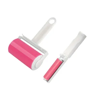 Washable and reusable pink lint roller set including a portable folding travel cleaner