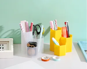 Hexagonal 3-slot desk organizer for pens and brushes in a study scene