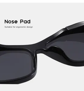 Detail of ergonomic integrated nose pad on black kids' sunglasses for comfort.