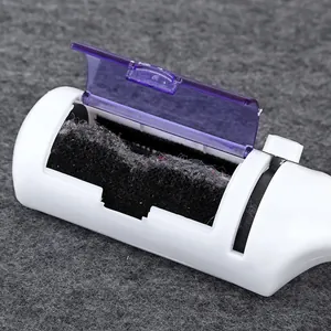 Reusable static pet hair remover brush for clothes with purple lid and white body