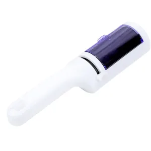 Handheld static lint remover for clothes and pet hair with purple protective cover