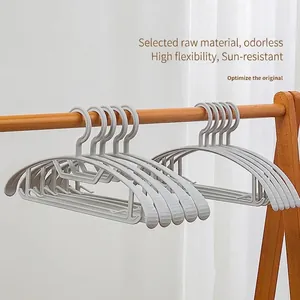 Non-slip wide-shoulder semi-circular plastic hangers for wet and dry clothes hanging.