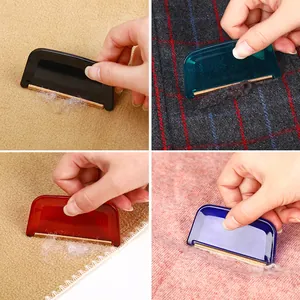 Portable lint removers for cashmere and wool coats shown in four different colors