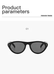 Detailed front view of black vintage cat-eye sunglasses with elegant gold rivet details