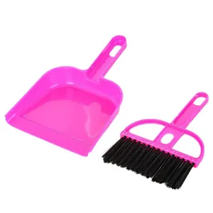 Portable mini pink desktop cleaning set with brush and dustpan for surface sweeping