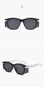 Detail views of cool kids sports sunglasses with curved frame and hollow temples.