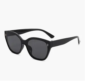 Close-up view of children's black fashion sunglasses with silver temple details.