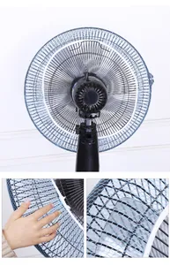 Detailed view of the fine blue mesh fan safety cover designed for baby finger protection