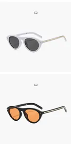 Retro cat eye sunglasses with metal rivets in white and black frame variants for fashion
