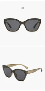 Detailed front and side view of stylish children's cat-eye sunglasses in tea green.
