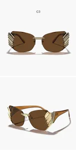 Detail view of modern rimless brown sunglasses with gold-tone decorative hardware.
