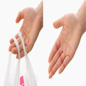 Demonstration of red marks and pain on fingers caused by heavy plastic bag handles