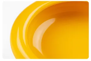 Detailed macro view of a bright yellow food-grade airtight storage container's glossy rim