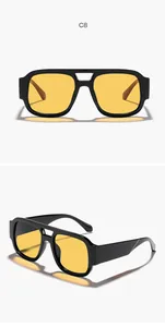 Vistas frontal y lateral de gafas de sol aviador vintage con montura negra y lentes amarillas