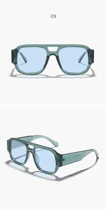 Vistas detalladas de las gafas de sol de aviador vintage verdes con lentes azules.