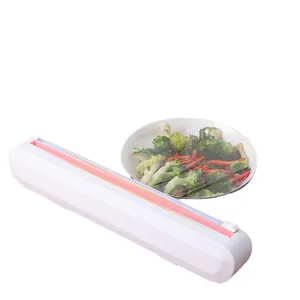 White cling film dispenser with slide cutter for efficient kitchen food preservation