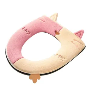 Universal warm plush toilet seat cover with cute cat design in pink and beige colors