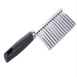 Detail shot of a professional stainless steel wavy crinkle cutter for potato chips