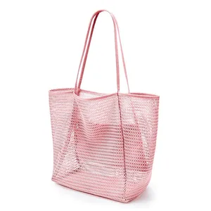 High-capacity pink mesh beach tote bag perfect for summer swimming and beach storage