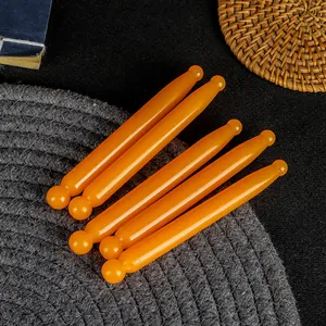 Set of amber resin meridian massage sticks for facial scraping and acupoint therapy
