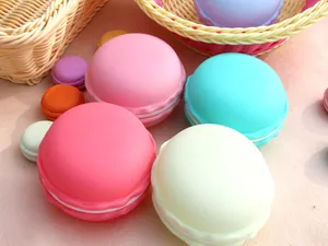 Close-up of colorful macaron-shaped jewelry storage boxes in various sizes