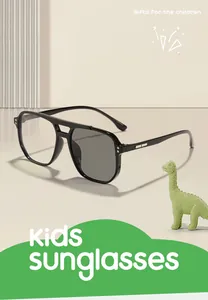 Detail of children's photochromic aviator glasses showing lens darkening effect