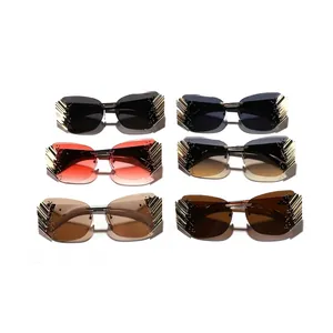 Modern rimless sunglasses with gold wing decor and rhinestones in multiple colors