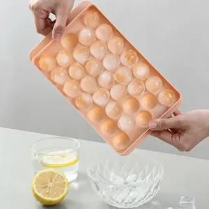 Moule à glaçons rond en plastique rose de grande capacité avec couvercle pour la maison