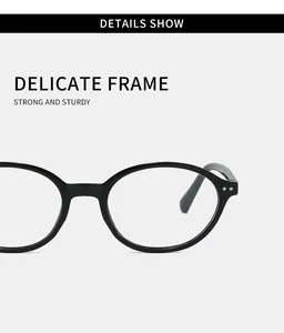 Detailed view of vintage black oval frame glasses with delicate sturdy design.