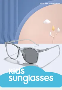 Detail view of kids square photochromic glasses showing light to dark lens transition