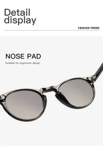 Detailed view of the ergonomic integrated nose pads on black round sunglasses