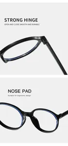 Detailed view of the strong hinge and ergonomic nose pad of vintage oval glasses.