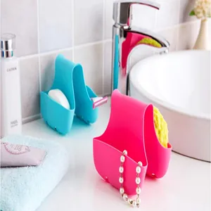 Saddle-style sink sponge holder drain bag for kitchen and bathroom storage.