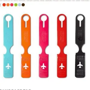Set of five colorful long strip airplane luggage tags for travel suitcase identification